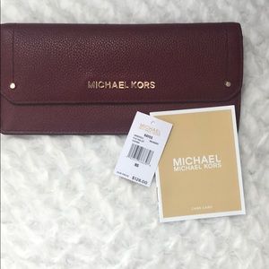PRICE DROP NWT Michael Kors Wallet in Mulberry